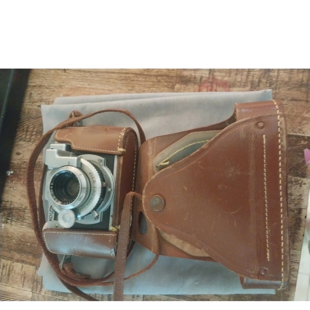 Vintage Camera with Brown Leather Case